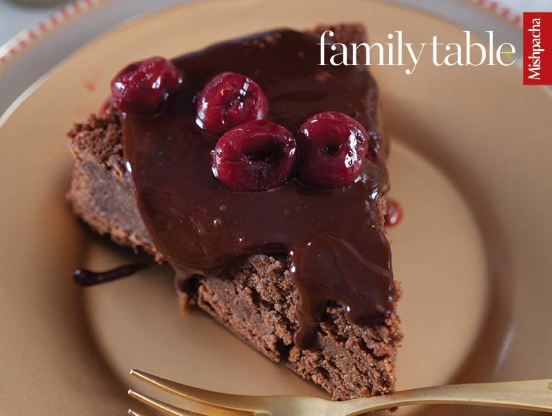 Dense Chocolate Cake with Ganache and Liqueur-Infused Cherries