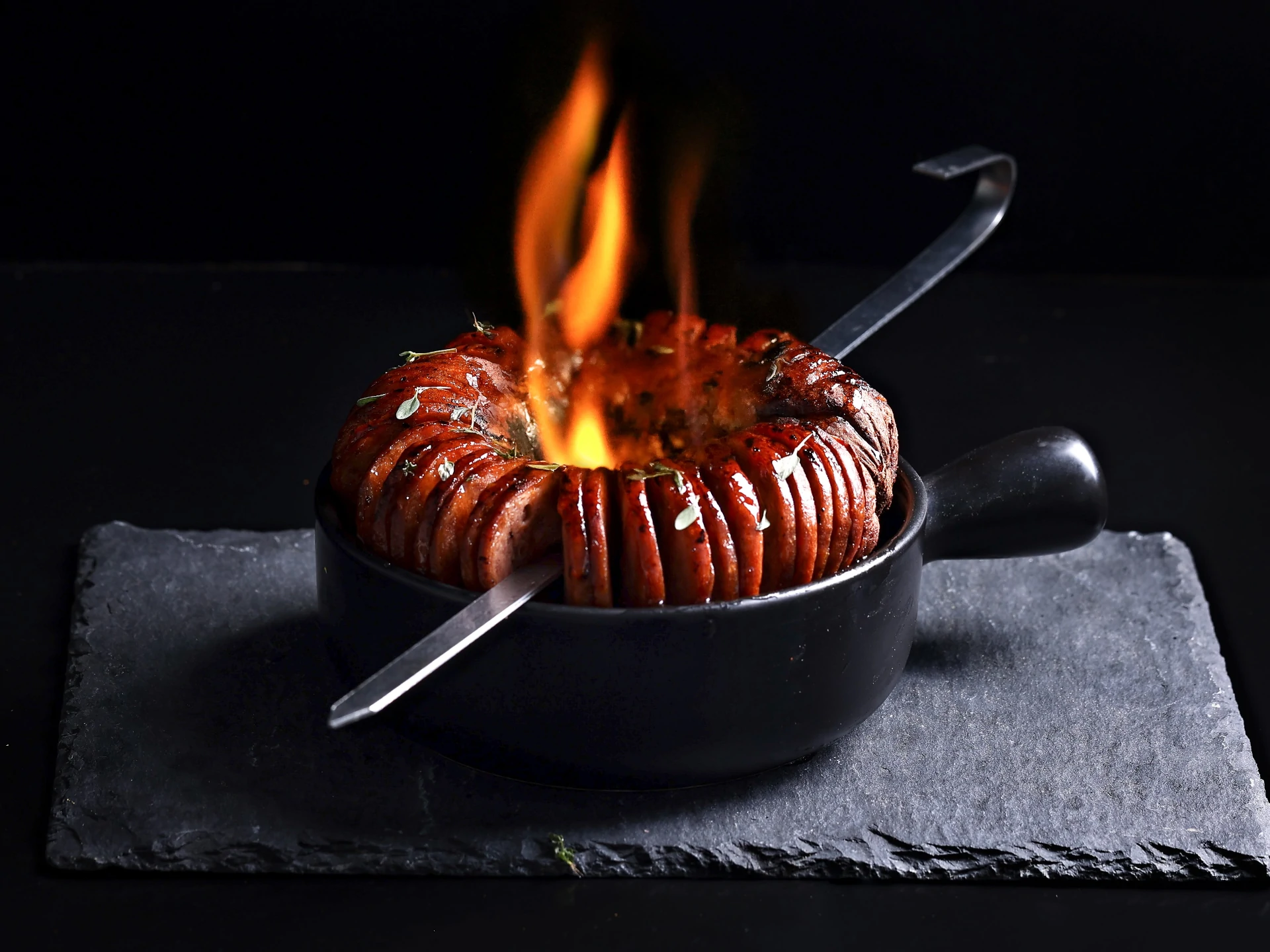 Flambé Grilled Hasselback Sausage