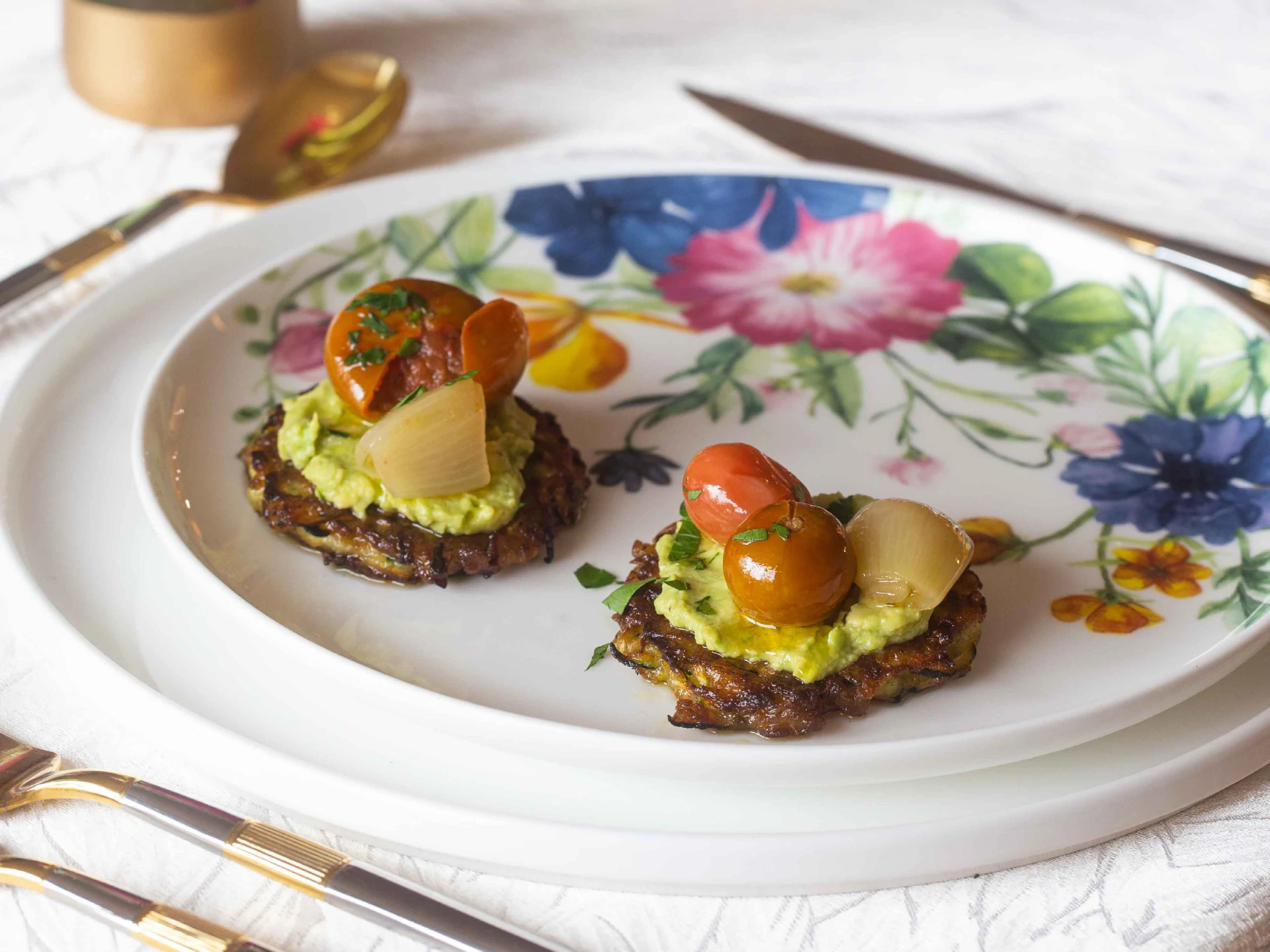 Zucchini Fritter Avocado “Toast” With Tomato and Shallot Confit