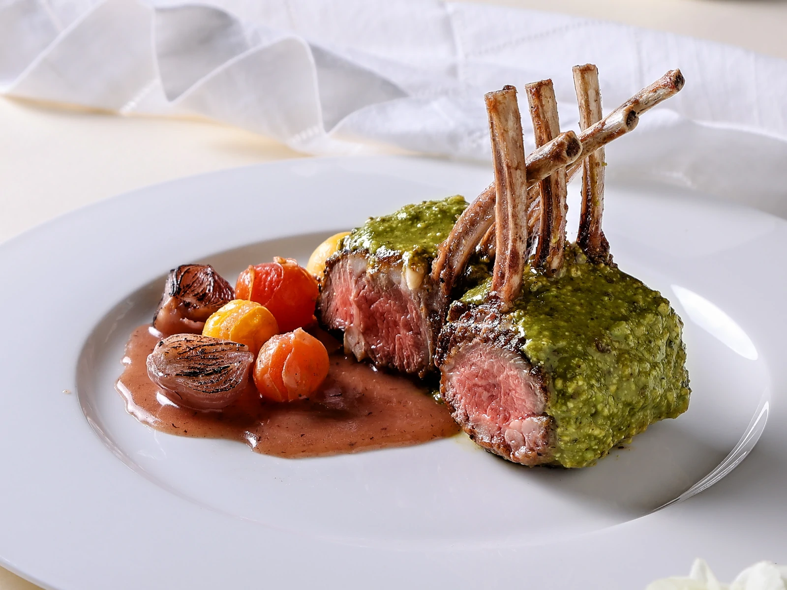 Pistachio-Crusted Lamb Lollipops with Roasted Tomatoes