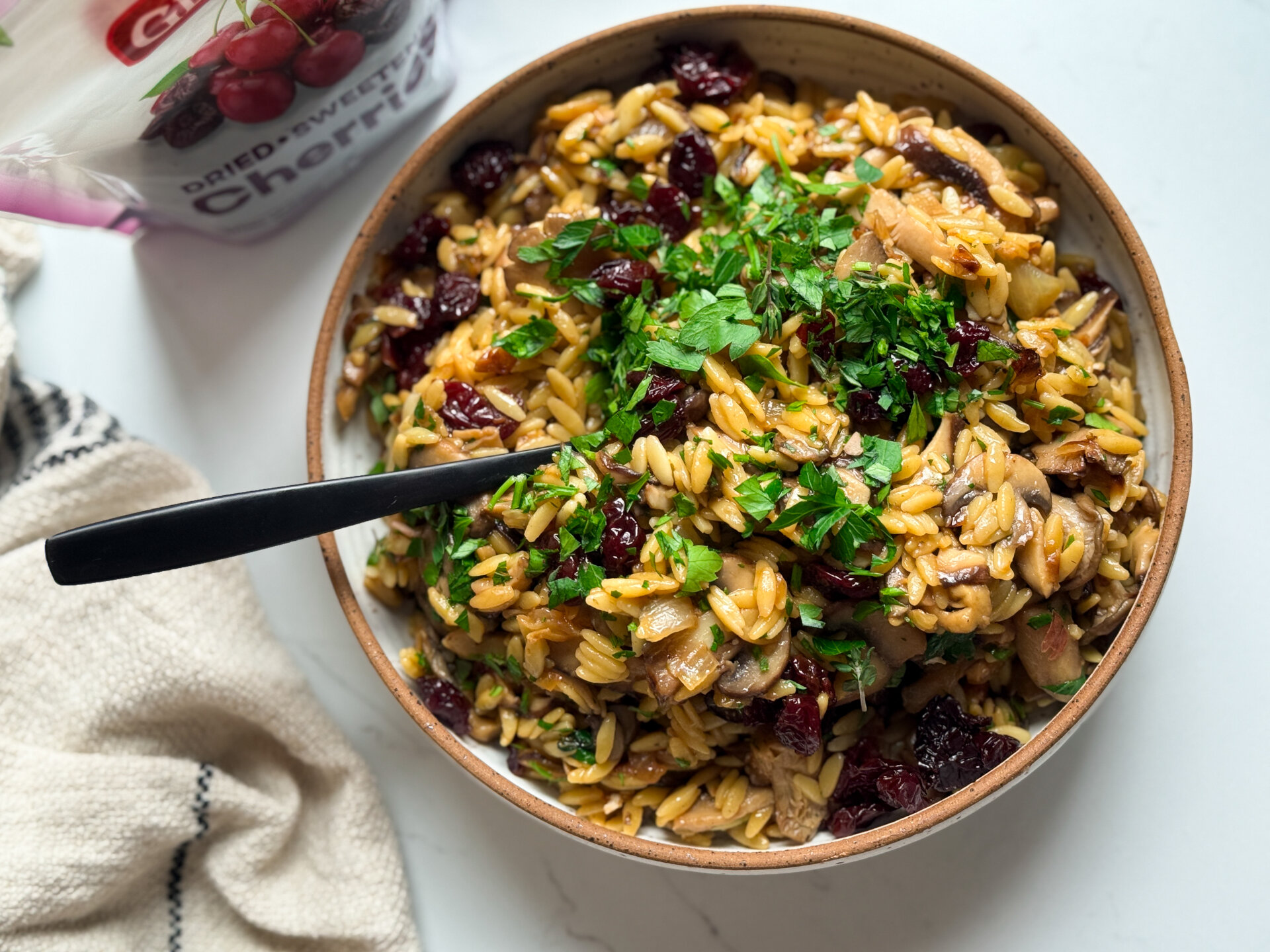 Orzo with Caramelized Onions, Sauteed Mushrooms, and Dried Cherries